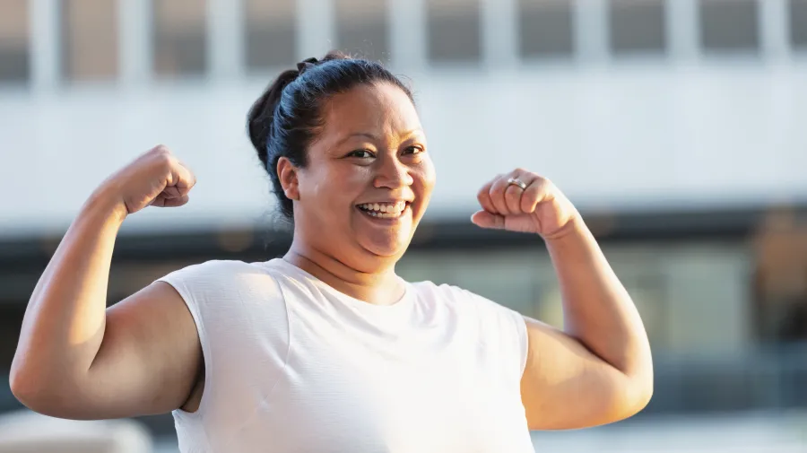 Lady flexing muscles